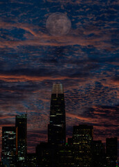 Fototapeta na wymiar When the moon shines at sunset on the city by the bay