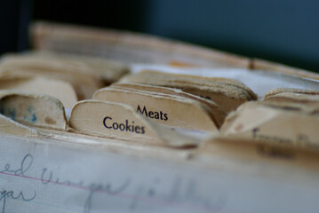 Closeup shot of a vintage recipe box with labeled tabs