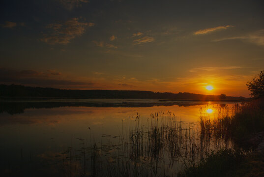 sunset over the lake © Daniel Paweł