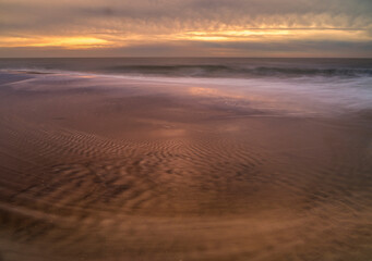 Fototapeta na wymiar USA, New Jersey, Cape May National Seashore. Sunrise on shore.