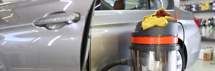 Cleaning car seat vacuum cleaners from dust closeup