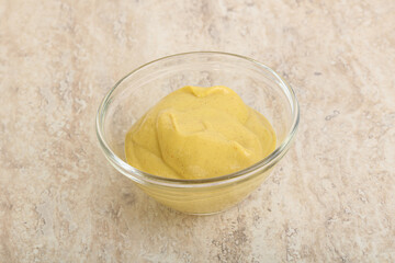 Organic mustard sauce in the bowl