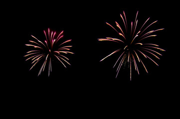 Fireworks on dark night sky.