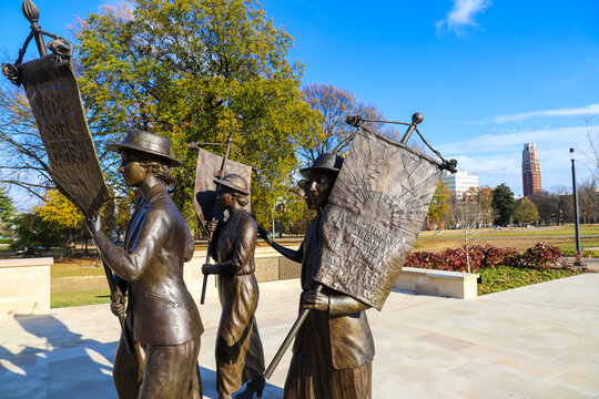 a shot of the copper statues at the Tennessee Woman's Suffrage Monument at Centennial Park in Nashville Tennessee USA
