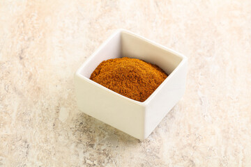 Dry Paprika powder in the bowl
