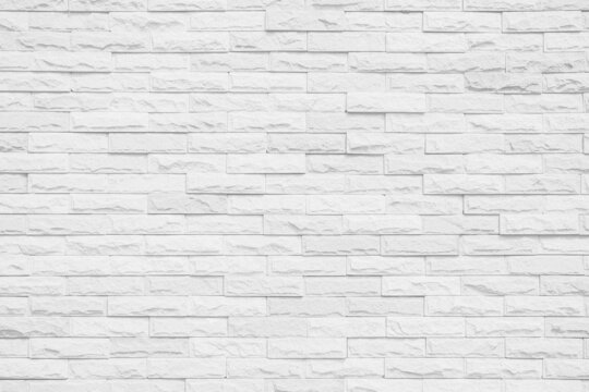 White brick wall texture background for stone tile block painted in grey light color wallpaper interior room backdrop design