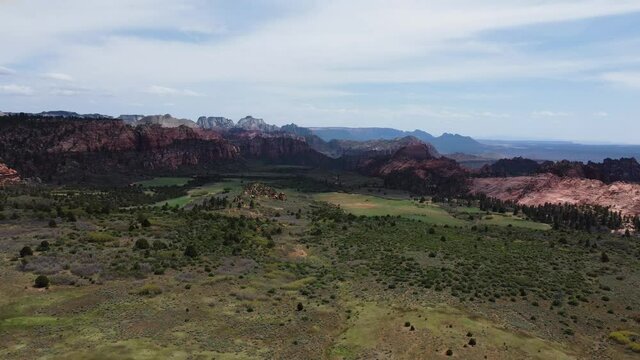 Zion National Park. Aerial jib drone view of the drone flying over the escarpment between hills
