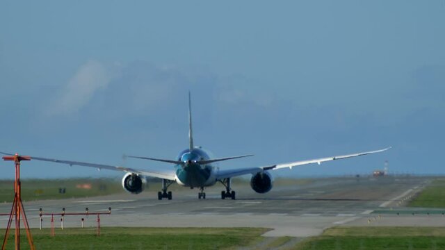 Wide Body Long Haul Airliner Taking Off From The Runway. Long Shot.