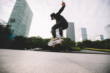 Skateboarder skateboarding outdoors in city