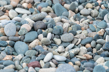 Fototapeta na wymiar Background of smooth small pebbles. Natural background, texture