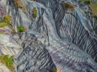 Sumalu sand dune in North Toraja, South Sulawesi, Indonesia, was formed by a natural process dominated by the wind, which brought sand from other areas and blew against the dunes