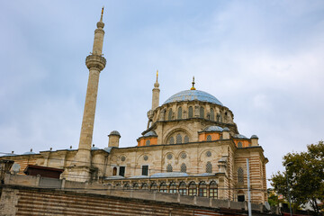 Fototapeta na wymiar Laleli Mosque in Istanbul with cloudy sky background.