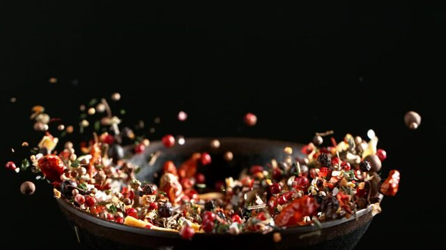 Super slow motion of crushing spice mix in grinder. Filmed on high speed cinema camera, 1000 fps.