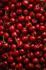 Background full with beautiful cherry fruit , front view and blank space for product advertising 