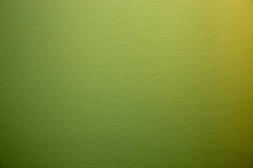 Green painted home wallpaper. Modern green yellow seamless texture background in light. home wall paper. Stucco surface background grunge wide.