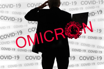Omicron title and the model of the virus. New COVID-19 variant. Coronavirus mutation. Person as...