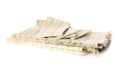 Stack of folded fabric napkins on white background