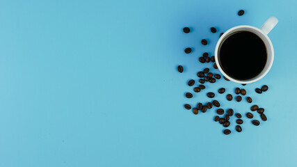 a cup of black coffee, roasted coffee beans isolated. morning drink. ready to work.