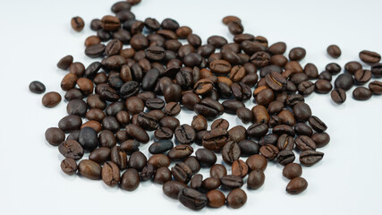 roasted coffee beans isolated on a white background.