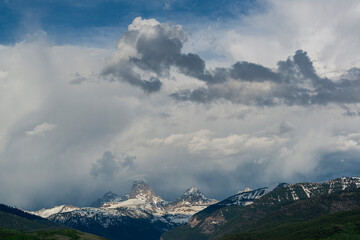 Dramatic clouds over Teton Mountains from the west