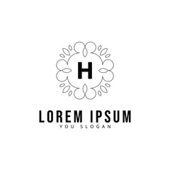 Fototapeta premium Creative vintage monogram logo with floral frame