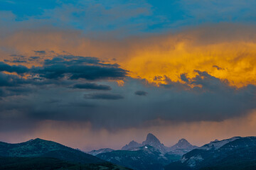 USA, Wyoming. Dramatic sky at sunset over Grand Teton, west side of Teton Mountains