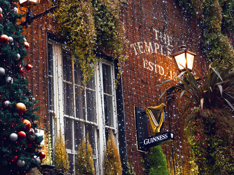 Dublin city, Ireland - 12.11.2021: Exterior decorations of the Temple bar for Christmas. Popular iconic place in Irish capital and main landmark.