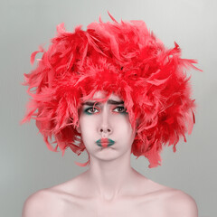 Fototapeta premium clown girl with feathers on her head