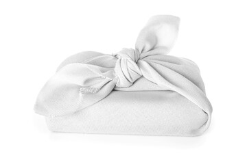 Gift box wrapped in fabric isolated on white background