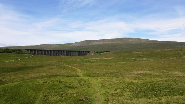Ribblehead or Batty Moss Viaduct, Yorkshire Dales National Park, England. Aerial rising