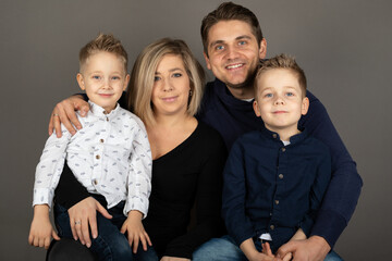 Happy family studio portrait