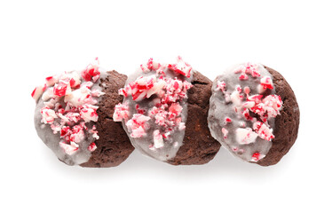 Tasty candy cane cookies on white background