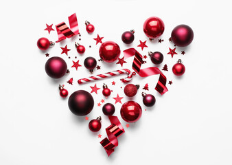 Heart made of Christmas decor on white background