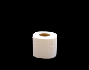 A roll of toilet paper on a black background. Opened toilet paper with white pattern on isolated black background. Selective focus. Space for text. Noise effect.