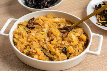 Christmas lenten sauerkraut with wild mushrooms and smoked plums.