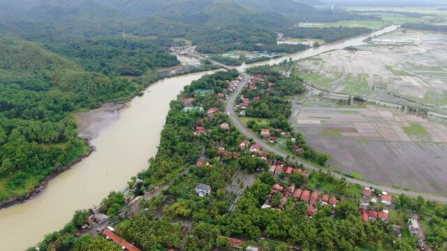 Telomoyo river crossing Kebumen district, Indonesia. Aerial forward