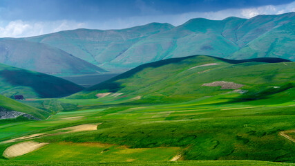 Obraz premium Piano Grande di Castelluccio, mountain and rural landscape