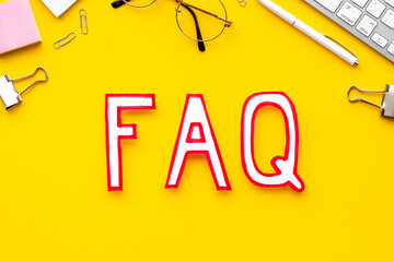 Information helpdesk concept with faq frequently asked questions text on working place