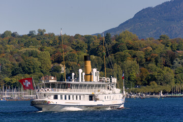 a vintage steamboat cruising on Lake Geneva, Geneva, Switzerland - obrazy, fototapety, plakaty
