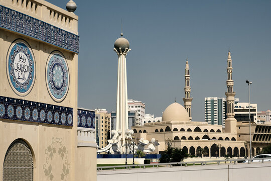 Beautiful shot of the King Faisal Mosque next to the Blue Souk in Sharjah