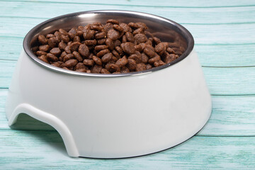 food and toys for dogs on the background. Concept pet care, playing and training.