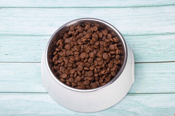 food and toys for dogs on the background. Concept pet care, playing and training.