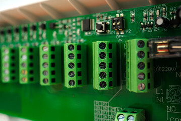 New modern controller for temperature control in heating systems, hot water and pumping groups control. Closeup © Yurii Zushchyk