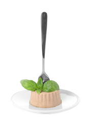 Plate of delicious meat pate with basil and fork isolated on white