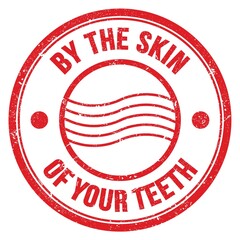 BY THE SKIN OF YOUR TEETH text on red round postal stamp sign