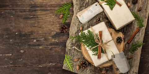 Zero waste gift concept. Christmas or New Year eco-friendly packaging. Festive boxes in craft paper