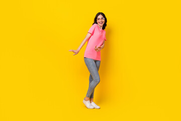 Fototapeta na wymiar Full size profile side photo of young pretty girl good mood shy look empty space isolated over yellow color background
