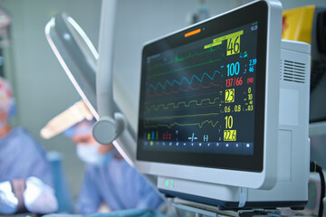 Heart rate and patient control monitor in hospital theater room during surgery operation - Powered by Adobe