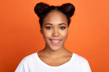 Photo of young lovely african woman toothy smile visit dentist cavity clinic isolated over orange color background