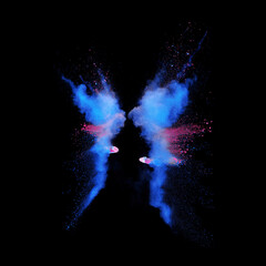 Bizarre forms of blue and pink powder paint explode in front of a black background to give off fantastic colors and forms.